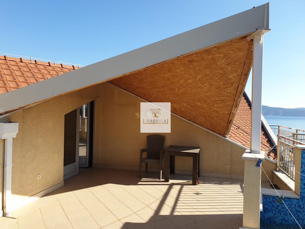 Modern penthouse with a private pool and sea view